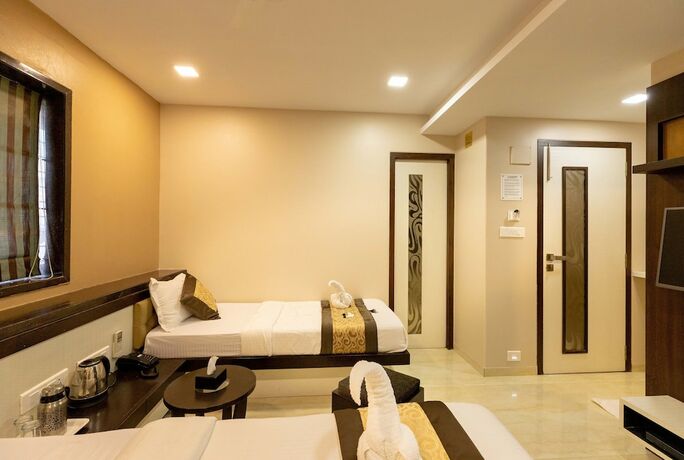 Imagen de la habitación del Hotel The Majlis - Near Taj Colaba. Foto 15