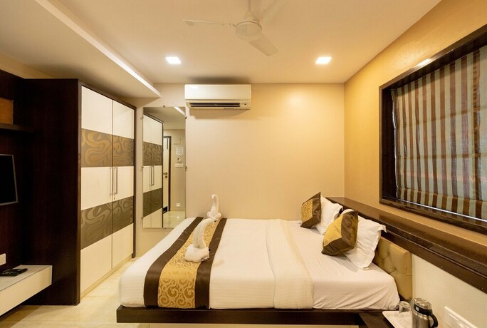 Imagen de la habitación del Hotel The Majlis - Near Taj Colaba. Foto 18