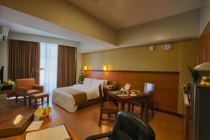 Imagen de la habitación del Hotel The Malayan Plaza. Foto 5