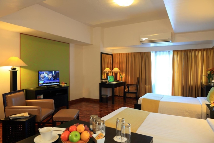 Imagen de la habitación del Hotel The Malayan Plaza. Foto 6