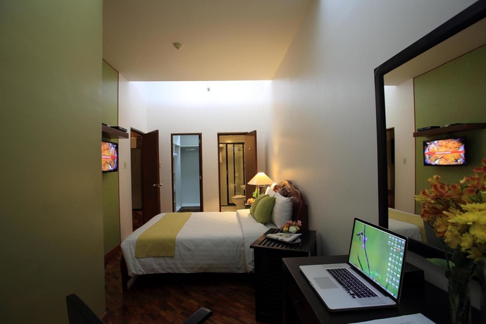 Imagen de la habitación del Hotel The Malayan Plaza. Foto 9