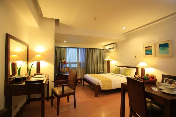 Imagen de la habitación del Hotel The Malayan Plaza. Foto 11