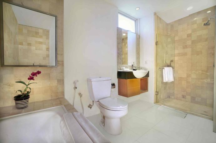 Imagen de la habitación del Hotel The Malibu Suites Balikpapan By Sissae Living. Foto 8