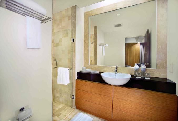 Imagen de la habitación del Hotel The Malibu Suites Balikpapan By Sissae Living. Foto 12