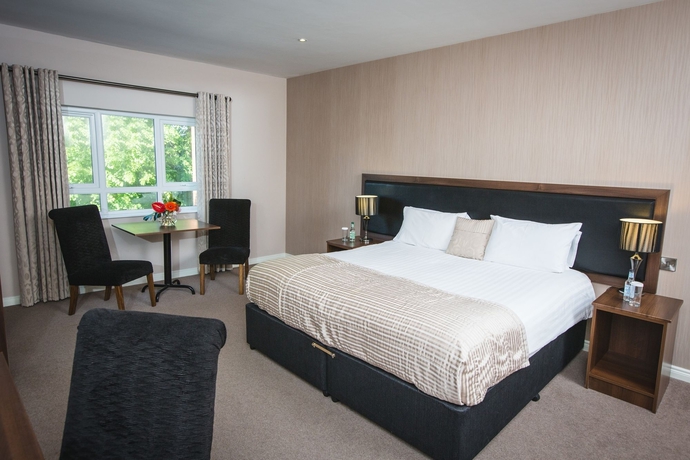 Imagen de la habitación del Hotel The Malone. Foto 7