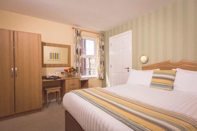 Imagen de la habitación del Hotel The Malone. Foto 11