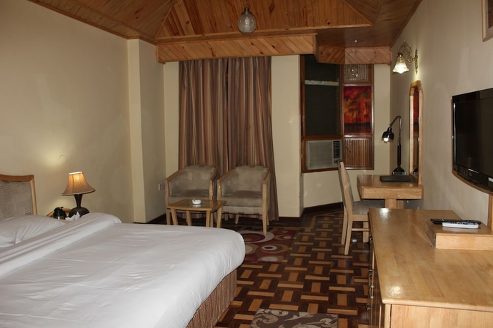 Imagen de la habitación del Hotel The Manali Inn. Foto 13