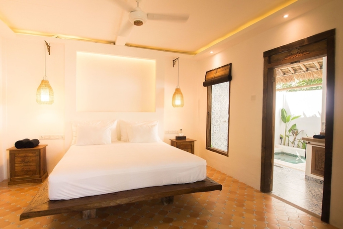 Imagen de la habitación del Hotel The Mandana Gili Air. Foto 2