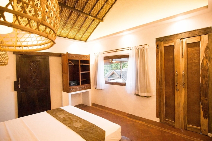 Imagen de la habitación del Hotel The Mandana Gili Air. Foto 11