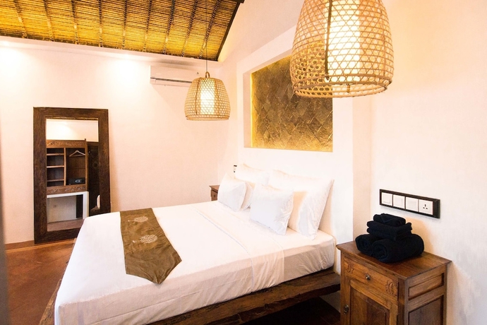 Imagen de la habitación del Hotel The Mandana Gili Air. Foto 13