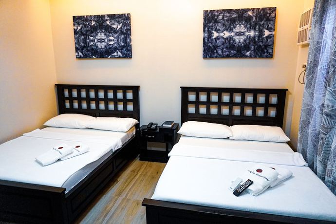 Imagen de la habitación del Hotel The Mang-Yan Grand Hotel by Cocotel. Foto 6