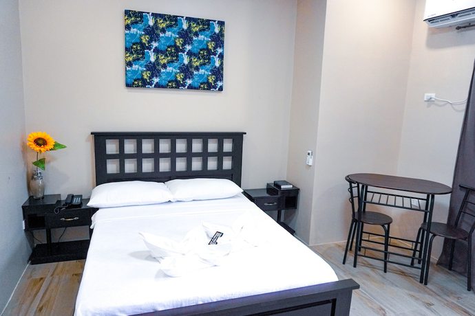 Imagen de la habitación del Hotel The Mang-Yan Grand Hotel by Cocotel. Foto 9