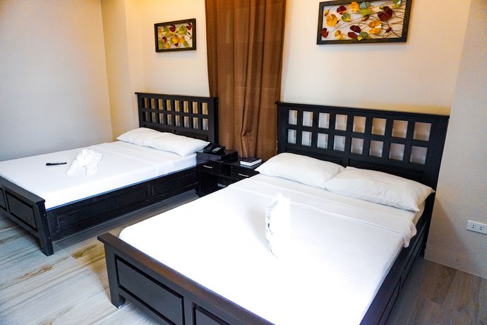 Imagen de la habitación del Hotel The Mang-Yan Grand Hotel by Cocotel. Foto 10