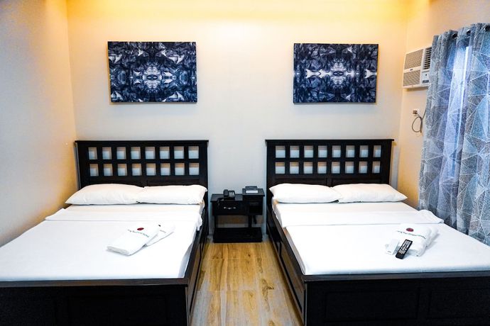 Imagen de la habitación del Hotel The Mang-Yan Grand Hotel by Cocotel. Foto 12