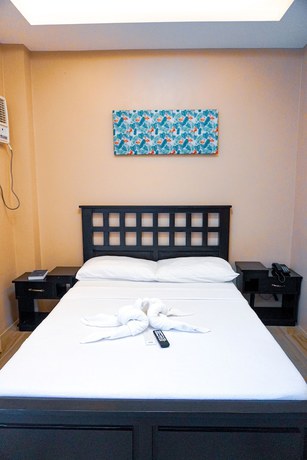 Imagen de la habitación del Hotel The Mang-Yan Grand Hotel by Cocotel. Foto 15