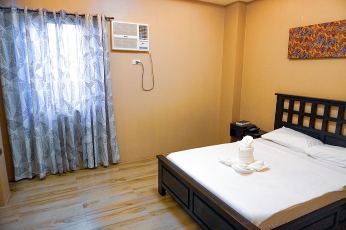 Imagen de la habitación del Hotel The Mang-Yan Grand Hotel by Cocotel. Foto 16