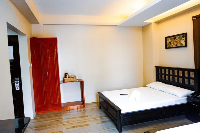Imagen de la habitación del Hotel The Mang-Yan Grand Hotel by Cocotel. Foto 17