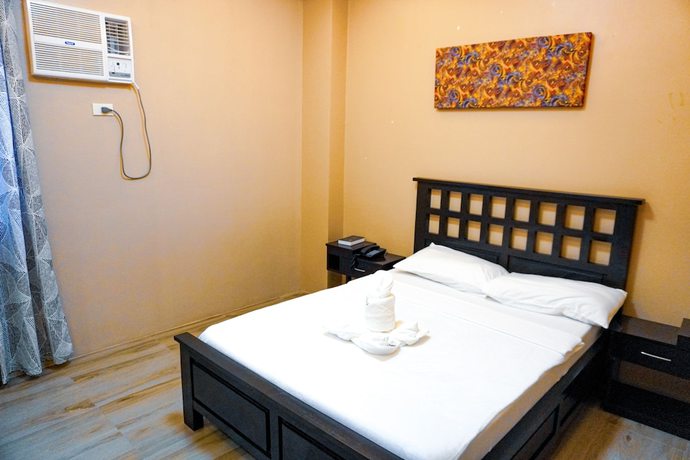 Imagen de la habitación del Hotel The Mang-Yan Grand Hotel by Cocotel. Foto 18