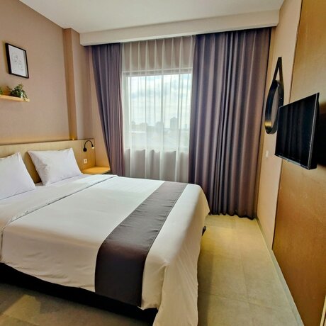 Imagen de la habitación del Hotel The Mango Suites By Flat06. Foto 13