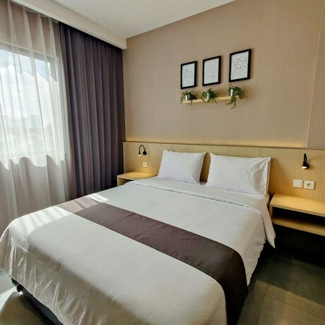 Imagen de la habitación del Hotel The Mango Suites By Flat06. Foto 15