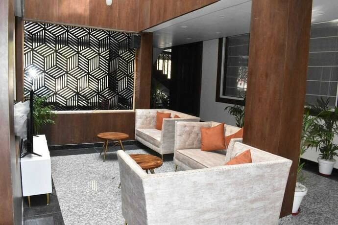 Imagen de la habitación del Hotel The Mango Tree. Foto 13