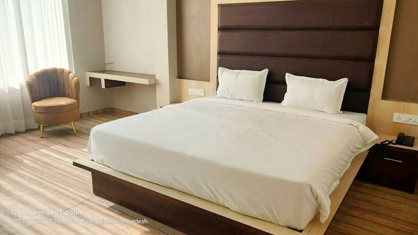 Imagen de la habitación del Hotel The Mango Tree. Foto 19