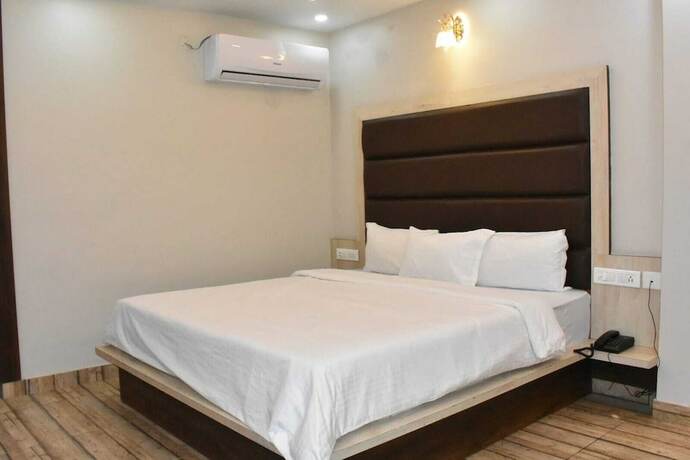 Imagen de la habitación del Hotel The Mango Tree. Foto 20