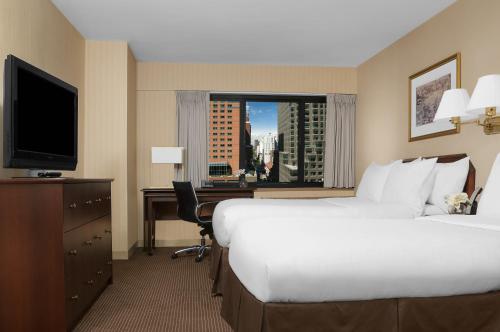 Imagen de la habitación del Hotel The Manhattan at Times Square. Foto 11