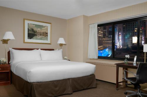 Imagen de la habitación del Hotel The Manhattan at Times Square. Foto 15