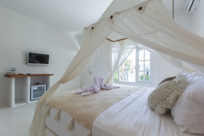 Imagen de la habitación del Hotel The Manik Toya Boutique Villa. Foto 20