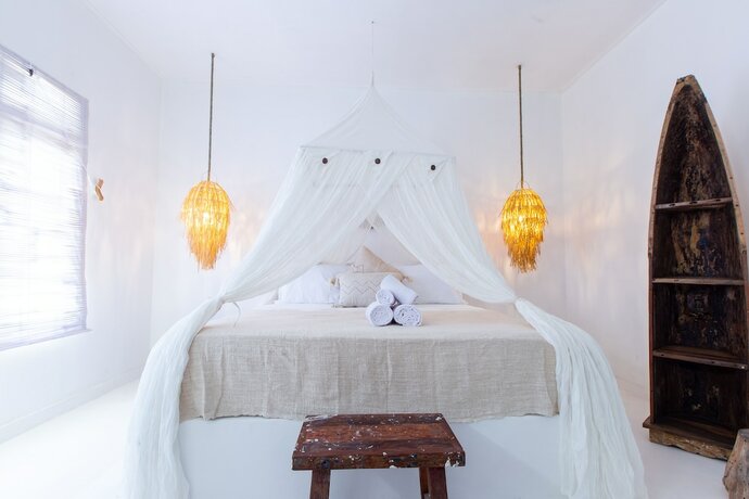 Imagen de la habitación del Hotel The Manik Toya Boutique Villa. Foto 30