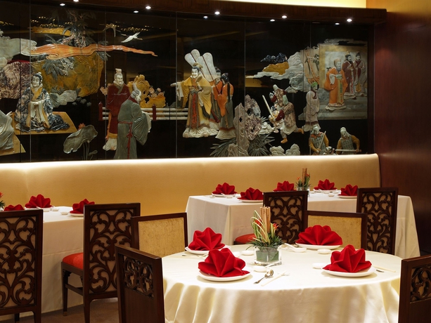 Imagen del bar/restaurante del Hotel The Manila. Foto 6