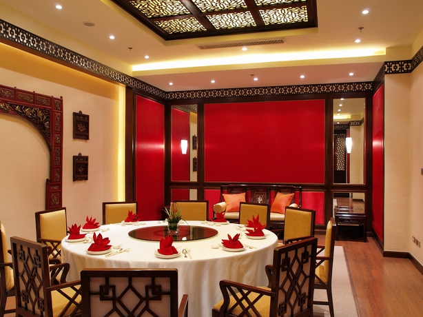 Imagen del bar/restaurante del Hotel The Manila. Foto 7