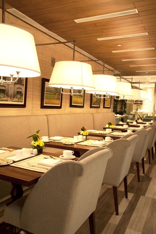 Imagen del bar/restaurante del Hotel The Manila. Foto 11