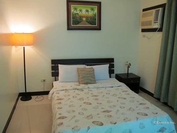 Imagen de la habitación del Hotel The Manor At Puerto Galera. Foto 2