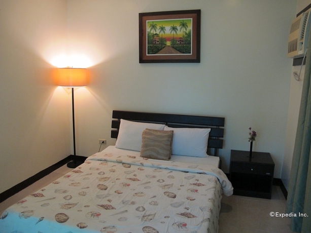 Imagen de la habitación del Hotel The Manor At Puerto Galera. Foto 3