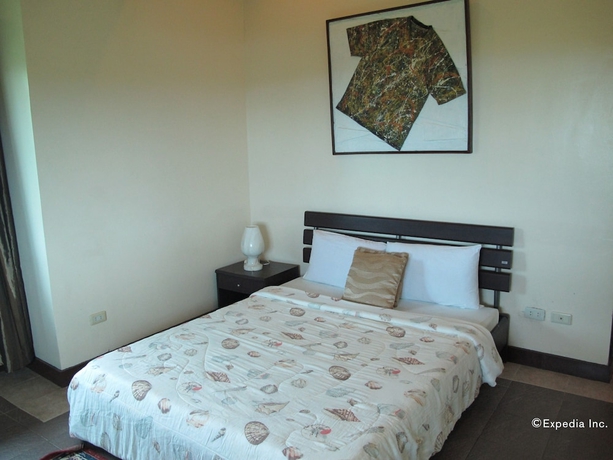 Imagen de la habitación del Hotel The Manor At Puerto Galera. Foto 4