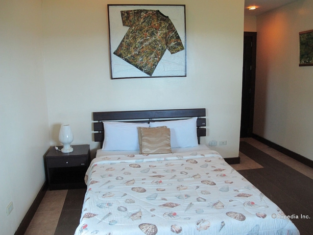 Imagen de la habitación del Hotel The Manor At Puerto Galera. Foto 5