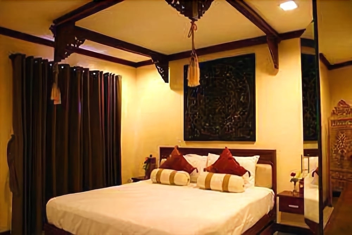 Imagen de la habitación del Hotel The Manor At Puerto Galera. Foto 9