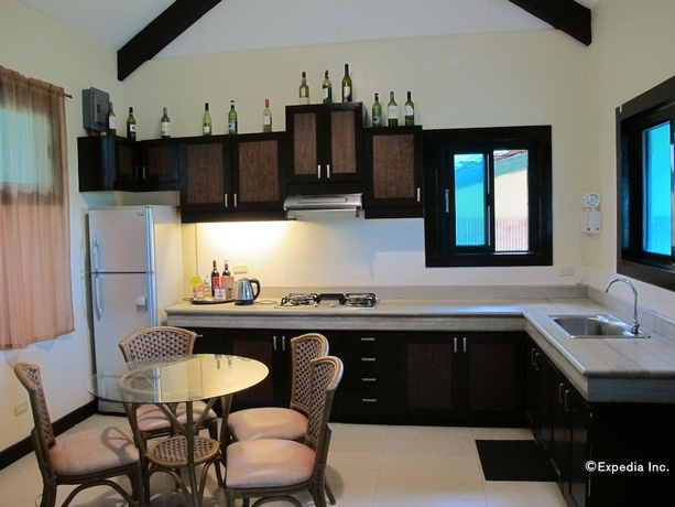 Imagen de la habitación del Hotel The Manor At Puerto Galera. Foto 11