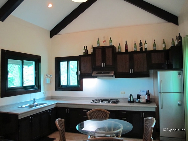 Imagen de la habitación del Hotel The Manor At Puerto Galera. Foto 13