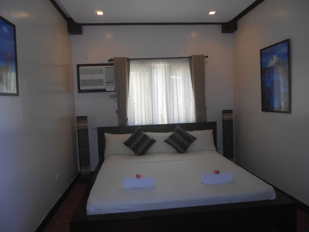 Imagen de la habitación del Hotel The Manor At Puerto Galera. Foto 15