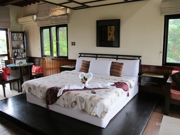 Imagen de la habitación del Hotel The Manor At Puerto Galera. Foto 16