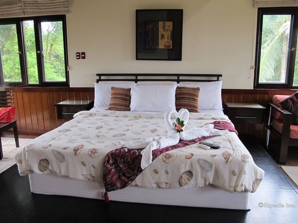 Imagen de la habitación del Hotel The Manor At Puerto Galera. Foto 17