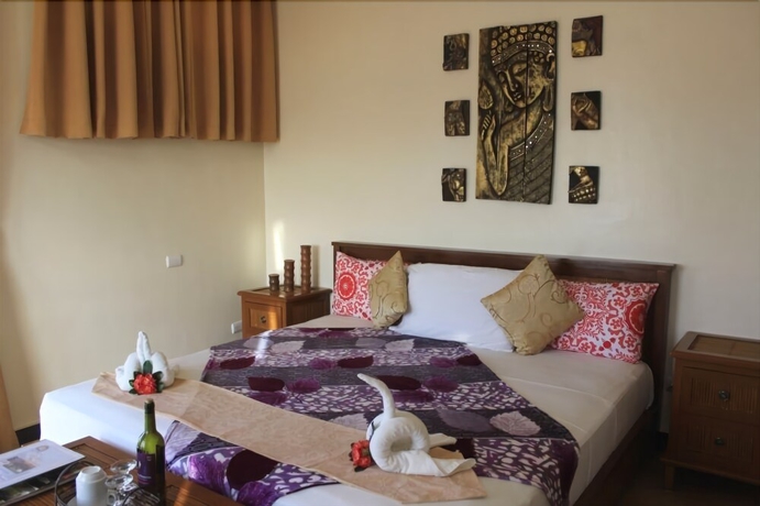 Imagen de la habitación del Hotel The Manor At Puerto Galera. Foto 18