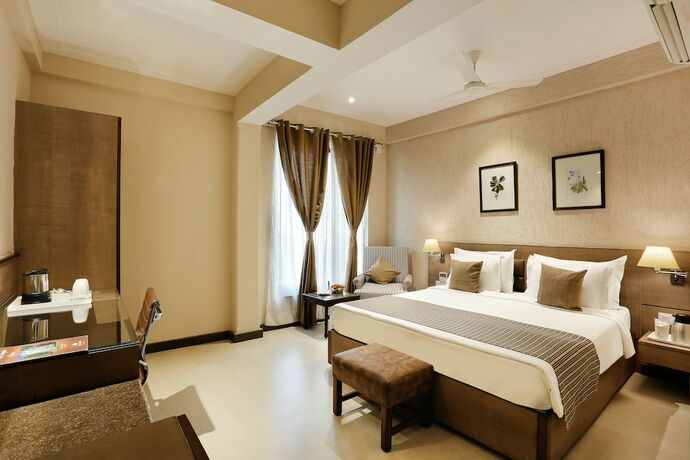 Imagen de la habitación del Hotel The Manor Bareilly. Foto 18