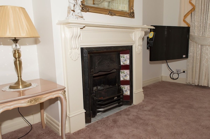 Imagen de la habitación del Hotel The Manor. Foto 10