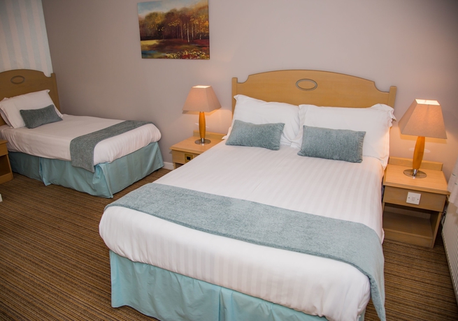 Imagen de la habitación del Hotel The Manor Guesthouse. Foto 6