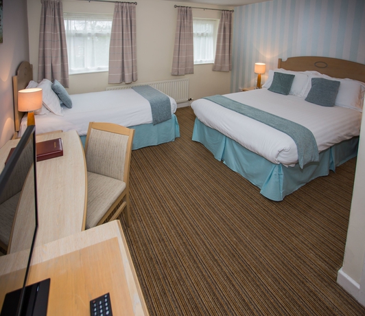 Imagen de la habitación del Hotel The Manor Guesthouse. Foto 7