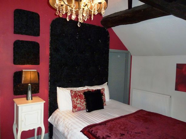 Imagen de la habitación del Hotel The Manor House. Foto 9